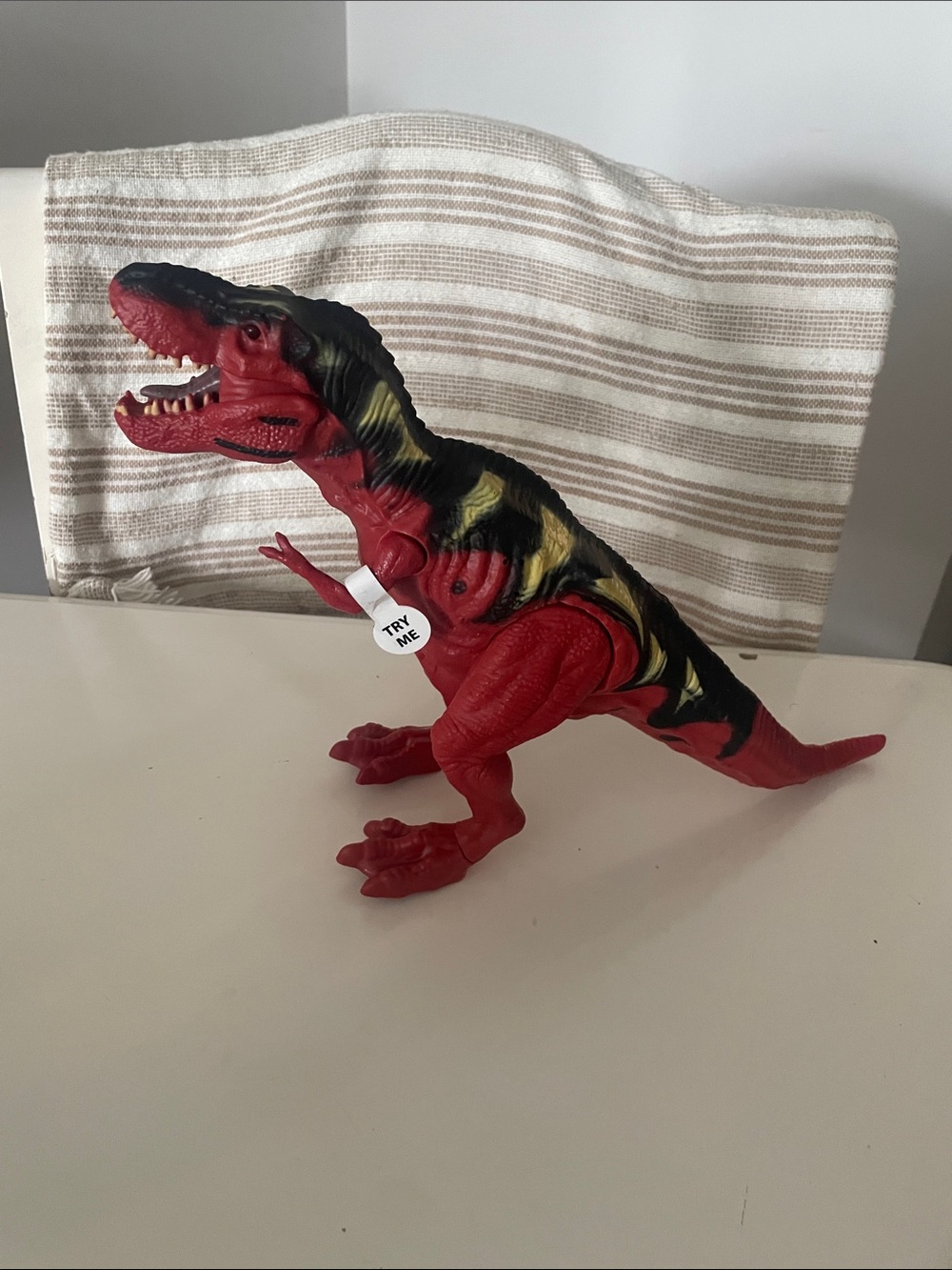 Red and Black T-Rex Dinosaur Toy with light up eyes and real sound!
